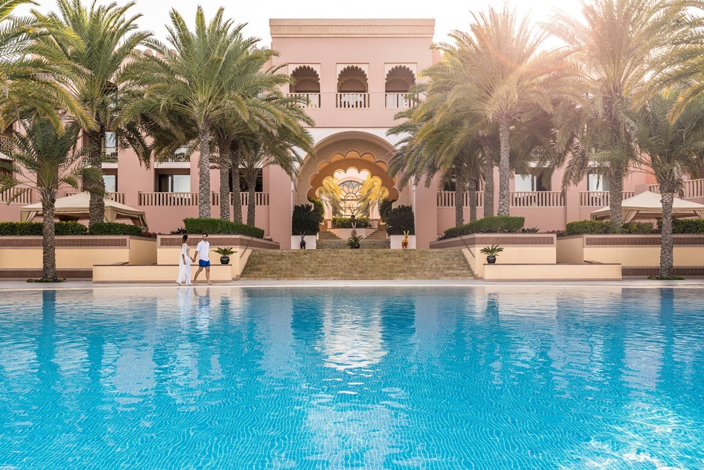 Al Husn main pool in late afternoon with people A.jpg